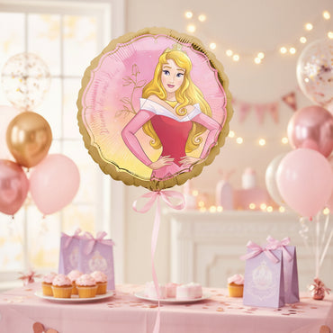Table setting with a princess-themed balloon and party decorations in a celebratory room. - Party Centre