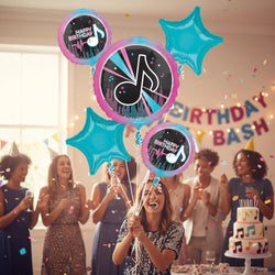 Set of birthday balloons with musical notes and 'Happy Birthday' text on a white background