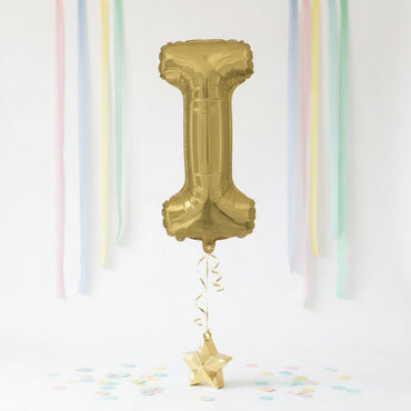 Gold number '1' balloon with decorative ribbons and confetti on a white background - Party Centre