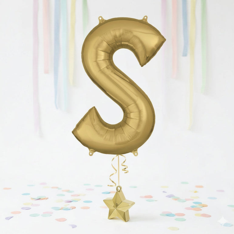Gold letter 'S' balloon with a star-shaped weight on a white background with colorful confetti.